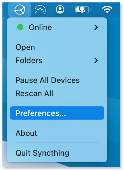 Selecting "Preferences" from the dropdown menu.